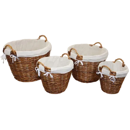 Four nested woven wicker baskets with natural brown handles and light beige fabric liners tied with white ribbon bows, shown on a white background.